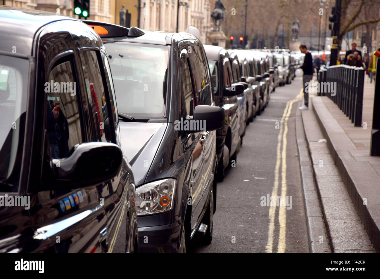 London, UK. 10th February, 2016. Thousands of black cab drivers bring central London to a standstill in protest at the deregulation of taxis and the rise of Uber. Whitehall. Credit:  PjrNews/Alamy Live News Stock Photo