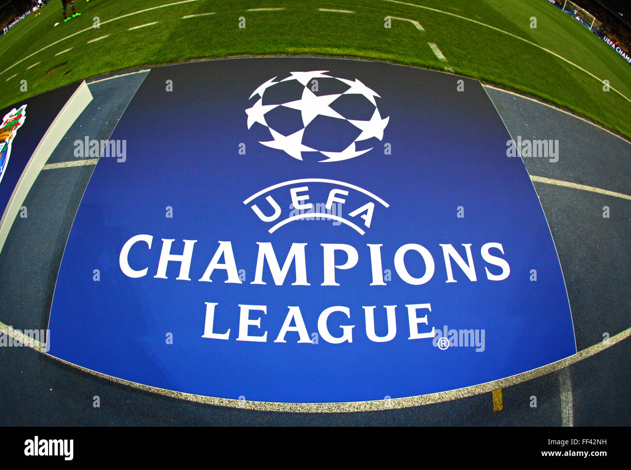 Board with UEFA Champions League Logo on the grass before the game between FC Dynamo Kyiv and FC Porto Stock Photo