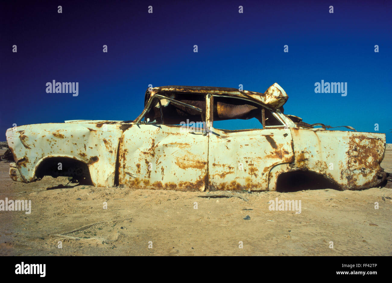 TUN, Tunisia, Jarbah Island, rusty cars at the beach near Houmt Souk.  TUN, Tunesien, Insel Djerba, verrostete Autos am Strand n Stock Photo