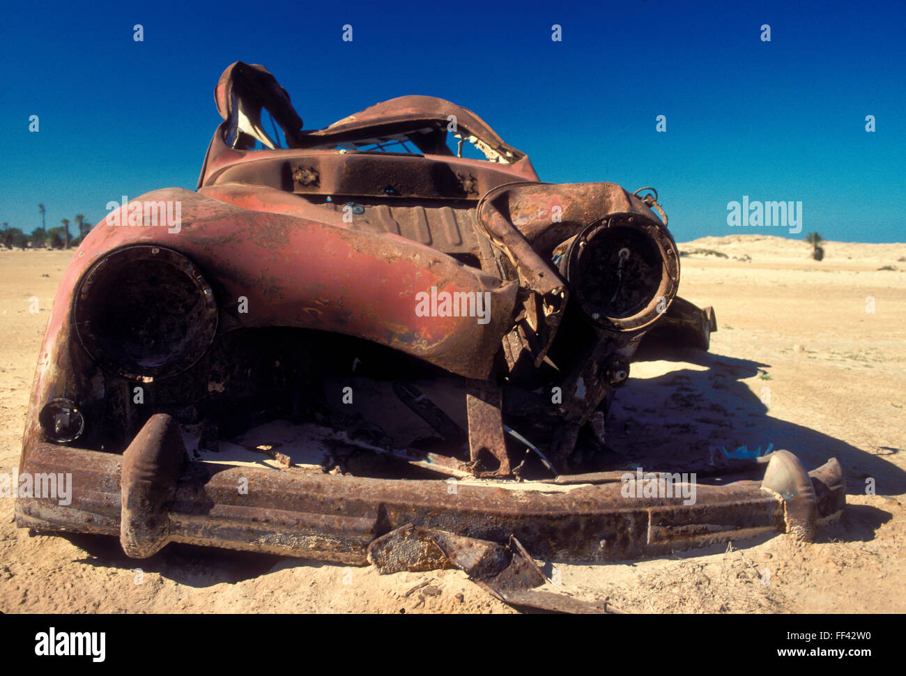 TUN, Tunisia, Jarbah Island, rusty cars at the beach near Houmt Souk.  TUN, Tunesien, Insel Djerba, verrostete Autos am Strand n Stock Photo