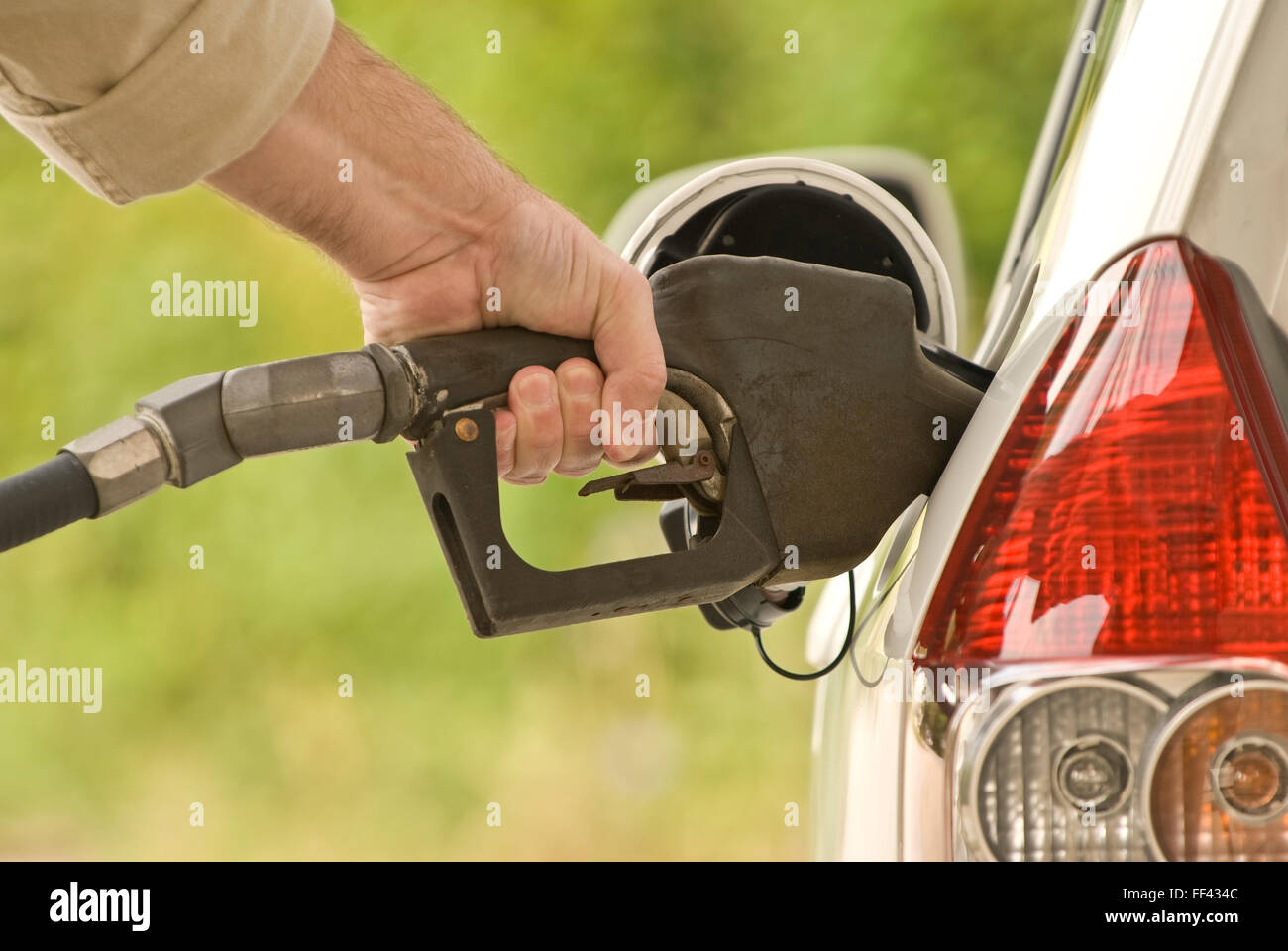 Hand Pumping Gasoline Stock Photo Alamy