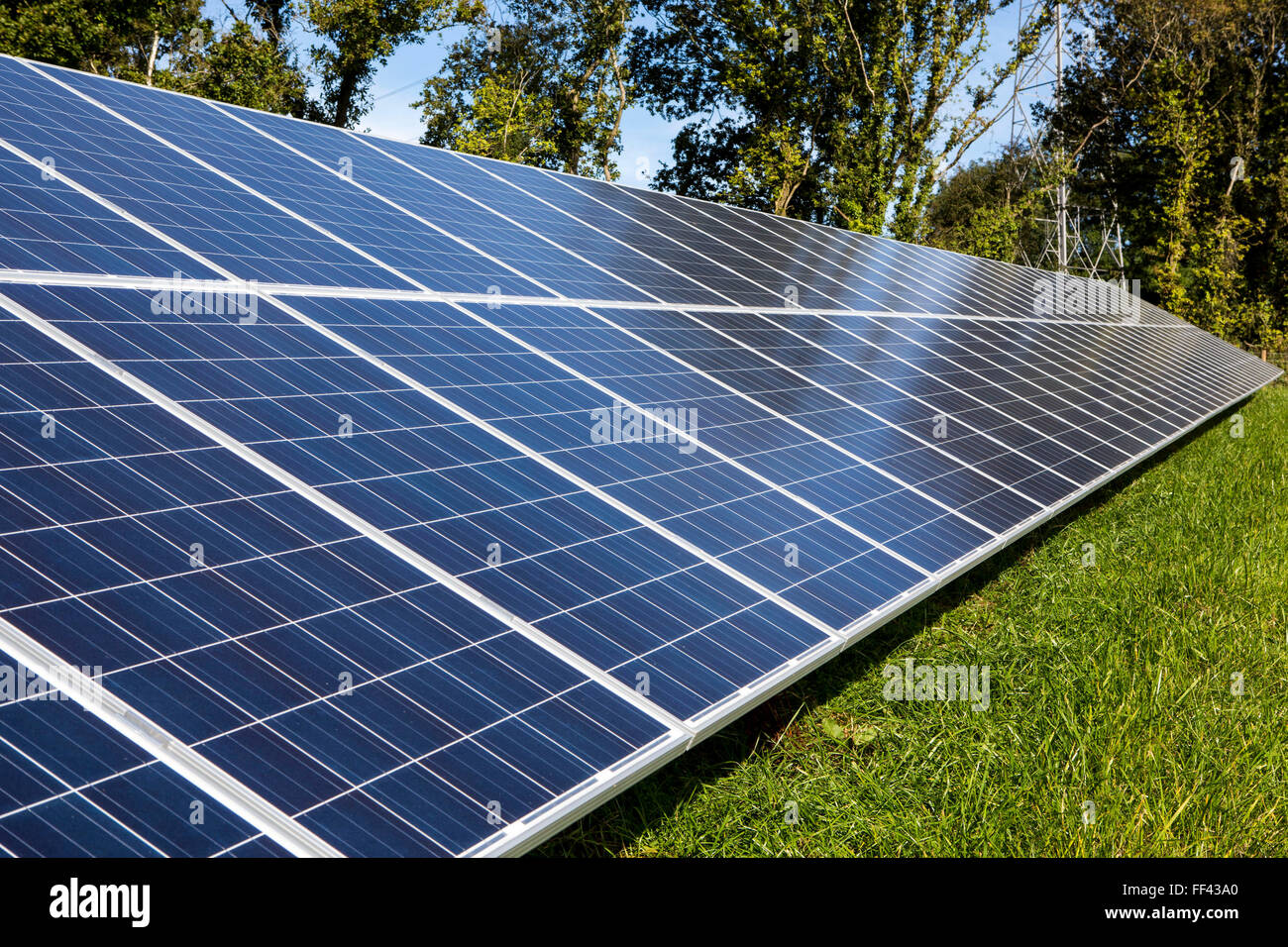 Solar panels of the 100kW solar array built by WREN, in partnership with South West Water, to power Nanstallon Sewage Treatment Works. WREN community energy. Wadebridge, Cornwall. UK Stock Photo