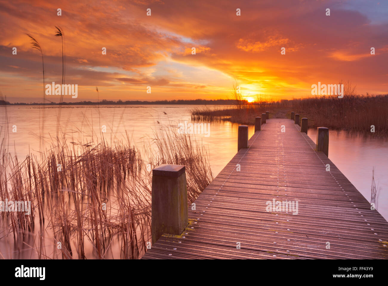 Spectacular sunrise over a lake near Amsterdam in The Netherlands. Stock Photo