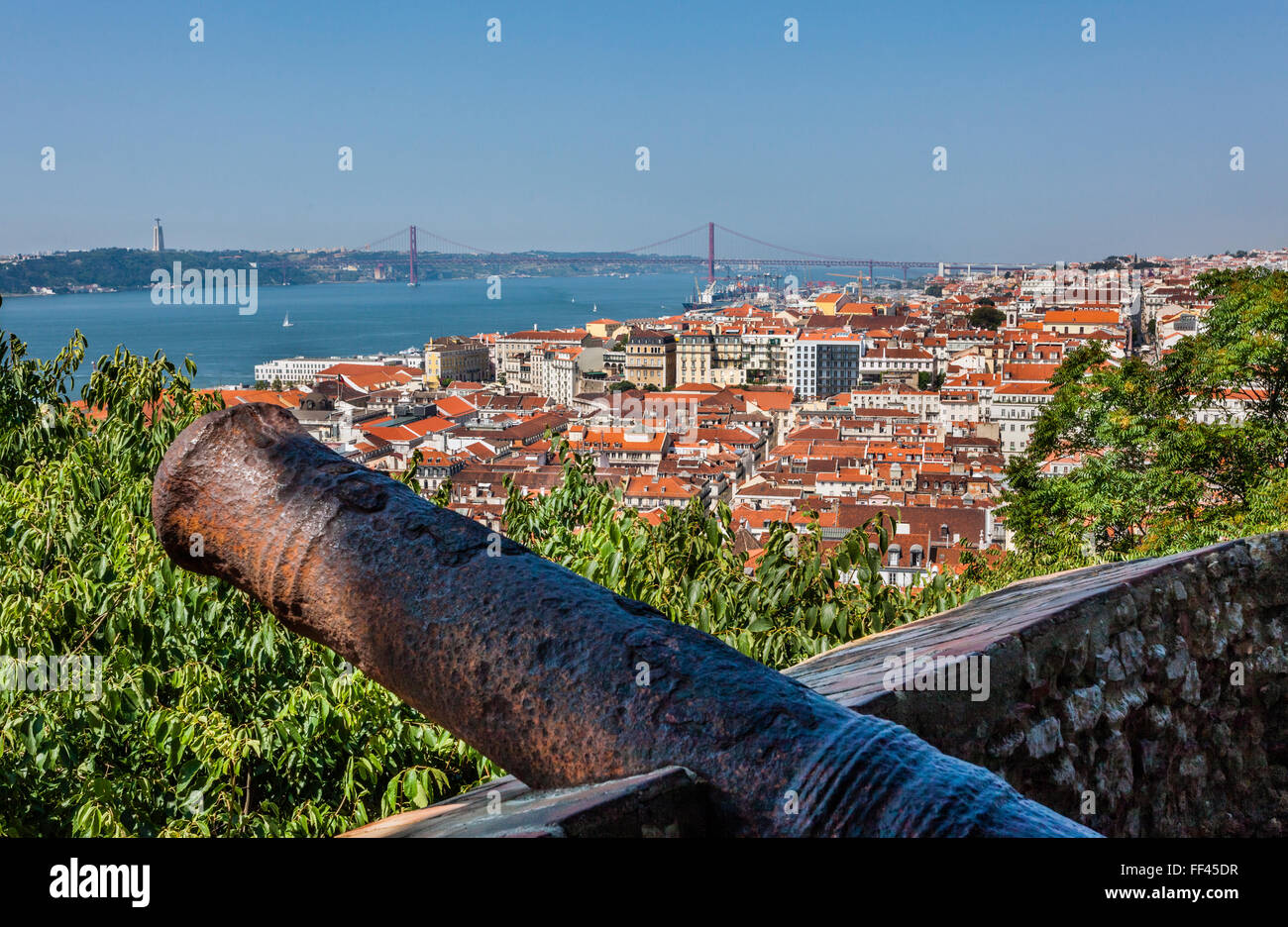 Portugal, Lisbon, a cannon at Castelo de Sao Jorge overlooking the Baixa Pombaline, the Pombaline Downtown of Lisbon Stock Photo