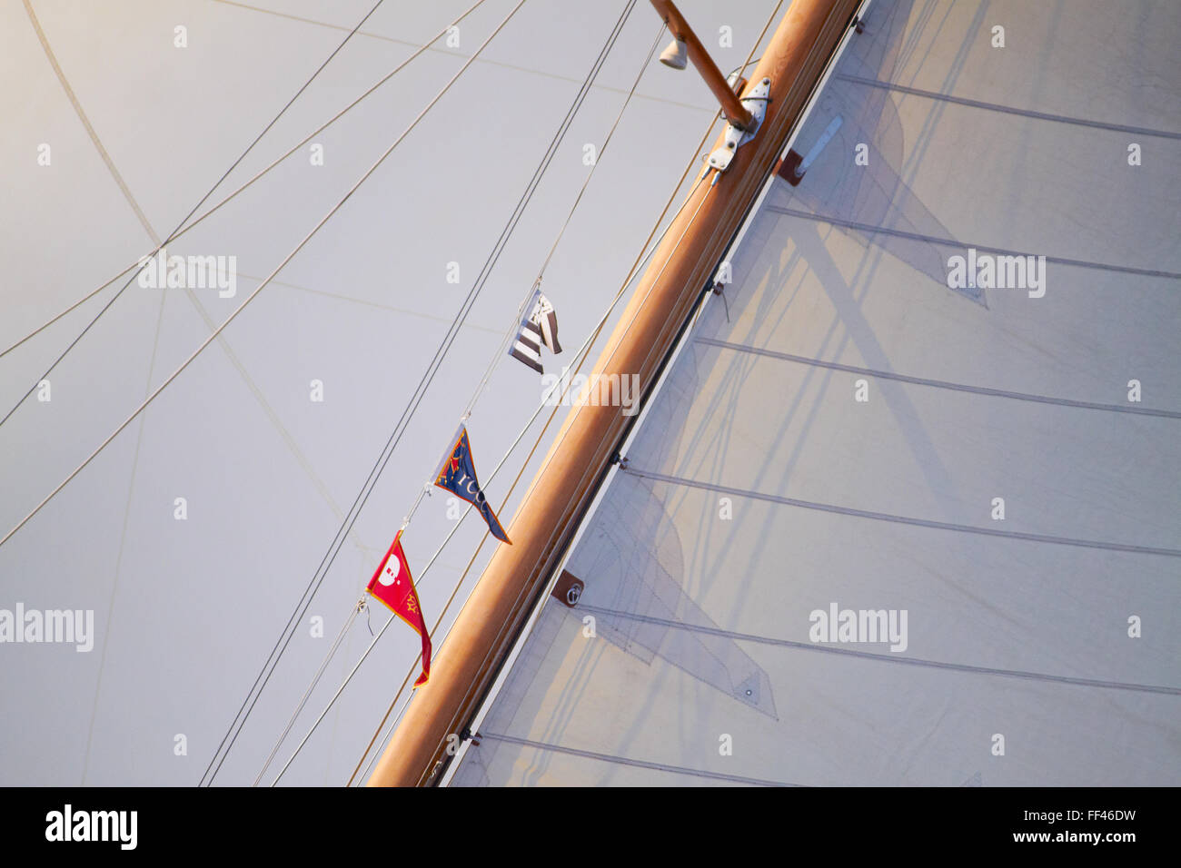 Flags and burgee signal flags flying on a classic yacht Stock Photo Alamy