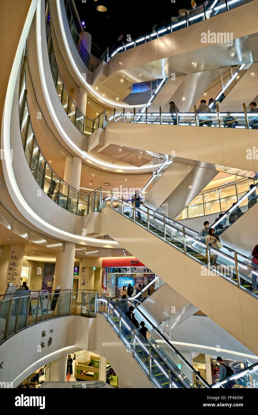 Japan, Honshu island, Kanto, Tokyo, escalators in a shopping mall. Stock Photo
