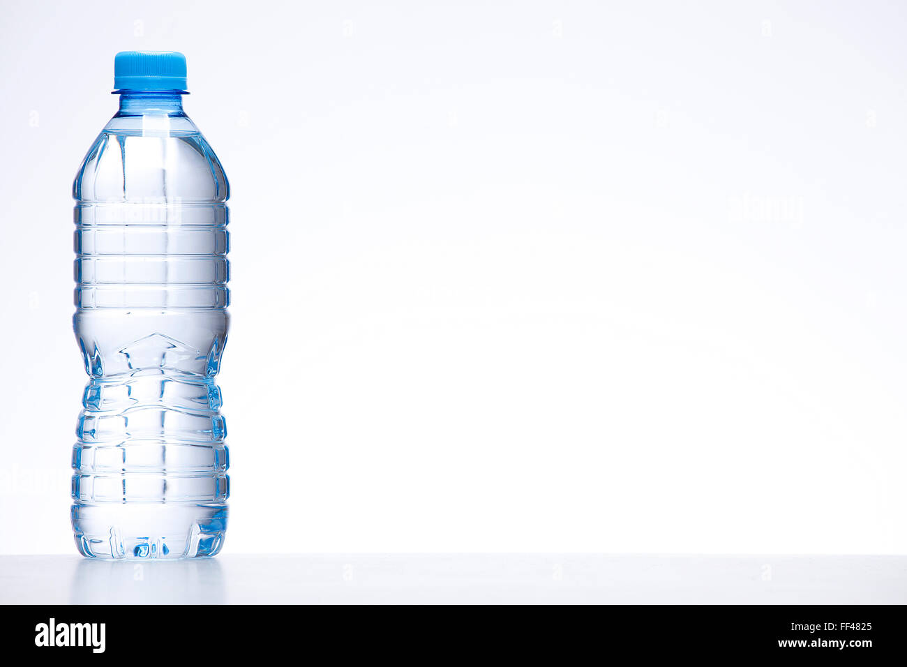 https://c8.alamy.com/comp/FF4825/blue-bottle-of-water-on-white-background-FF4825.jpg