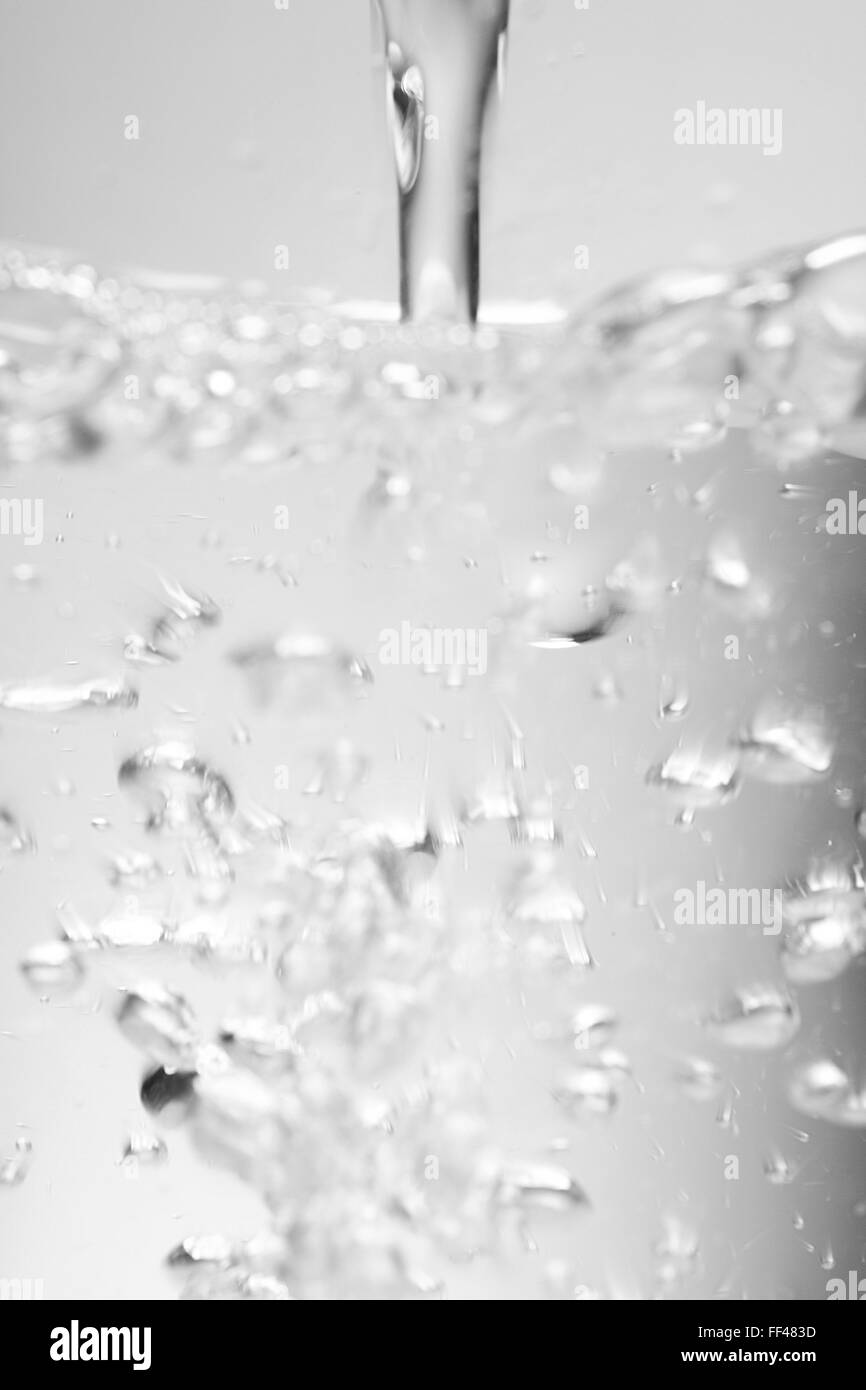 running water with fizz Stock Photo
