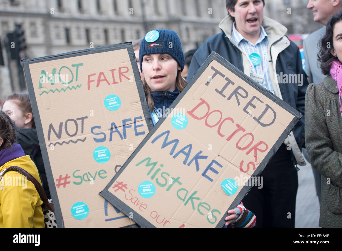 London, UK. 10th February, 2016.  Junior doctors march on Parliament with banners Credit:  Ian Davidson/Alamy Live News Stock Photo