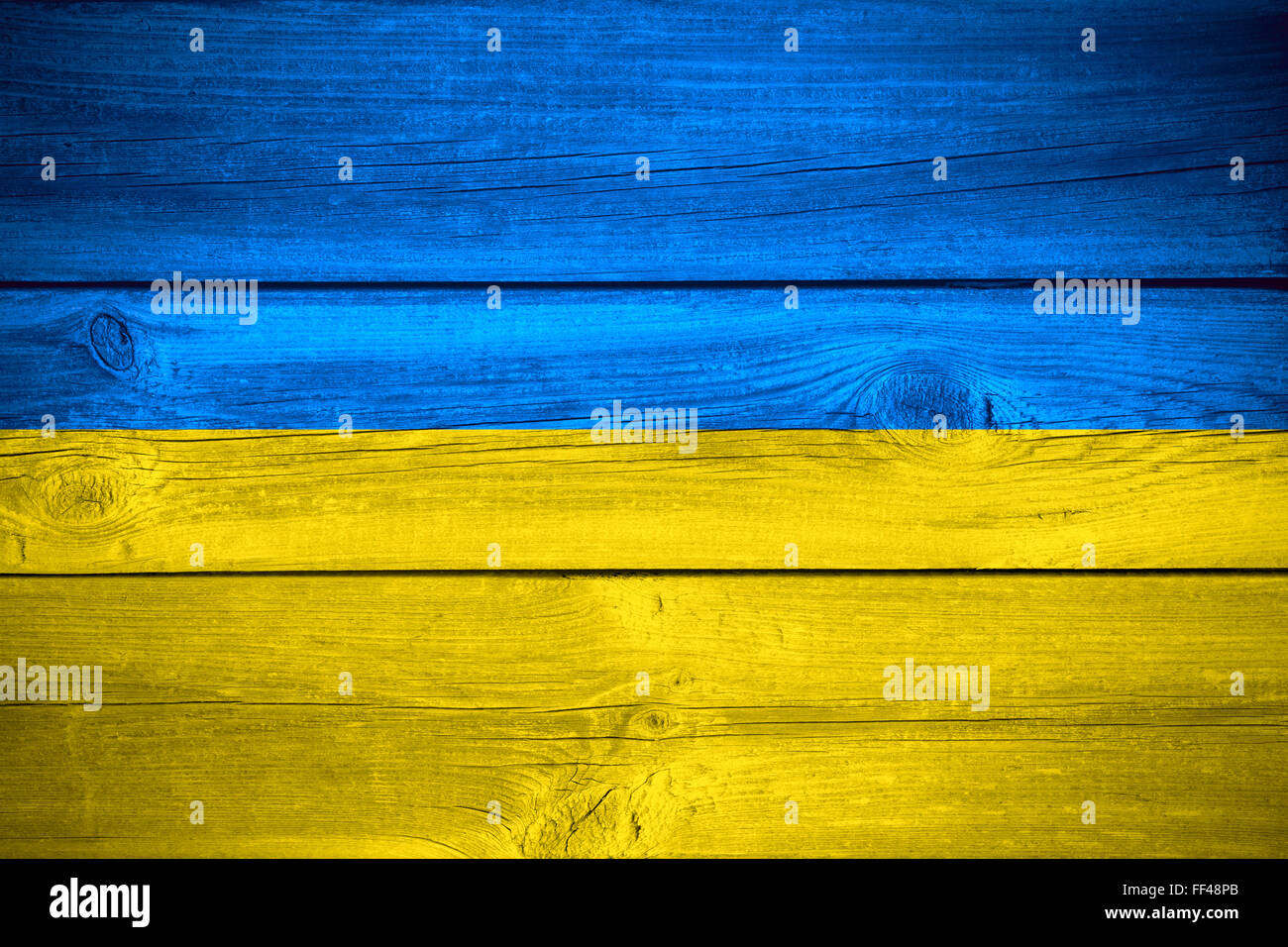 flag of Ukraine or Ukrainian banner on wooden background Stock Photo