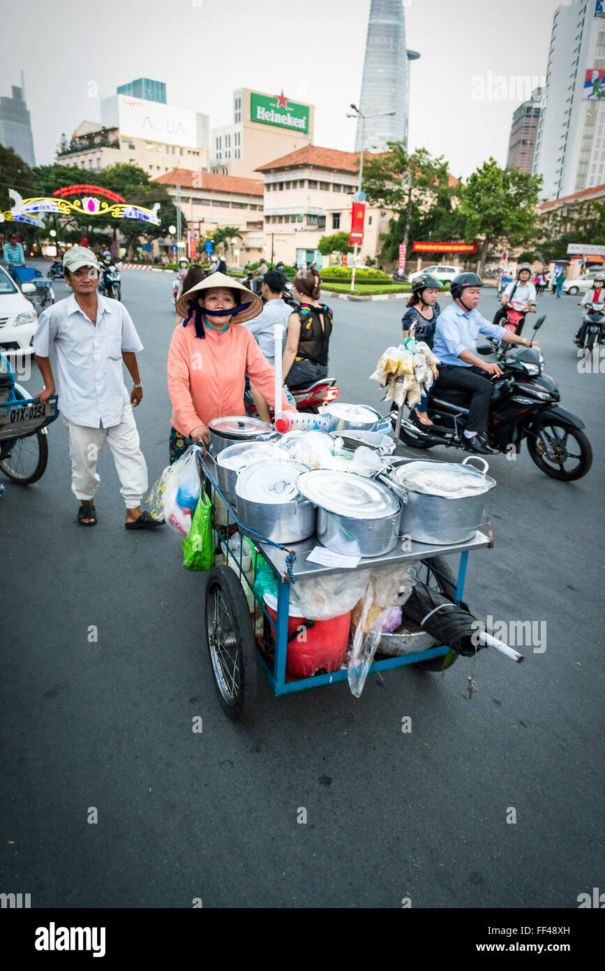 street food vendor next to Chợ Bến Thành Market. Vietnam street life. Stock Photo
