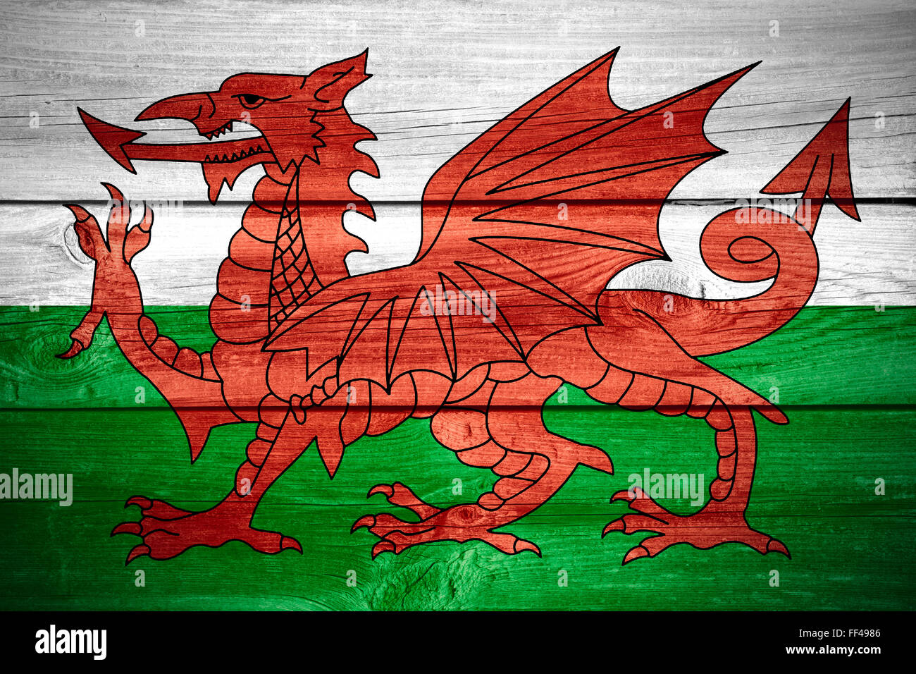 flag of Wales or Welsh banner on wooden background Stock Photo