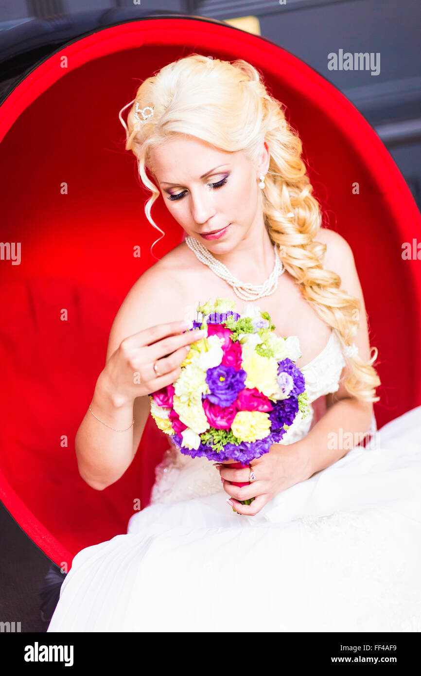bridal bouquet of flowers in hands of the bride Stock Photo - Alamy
