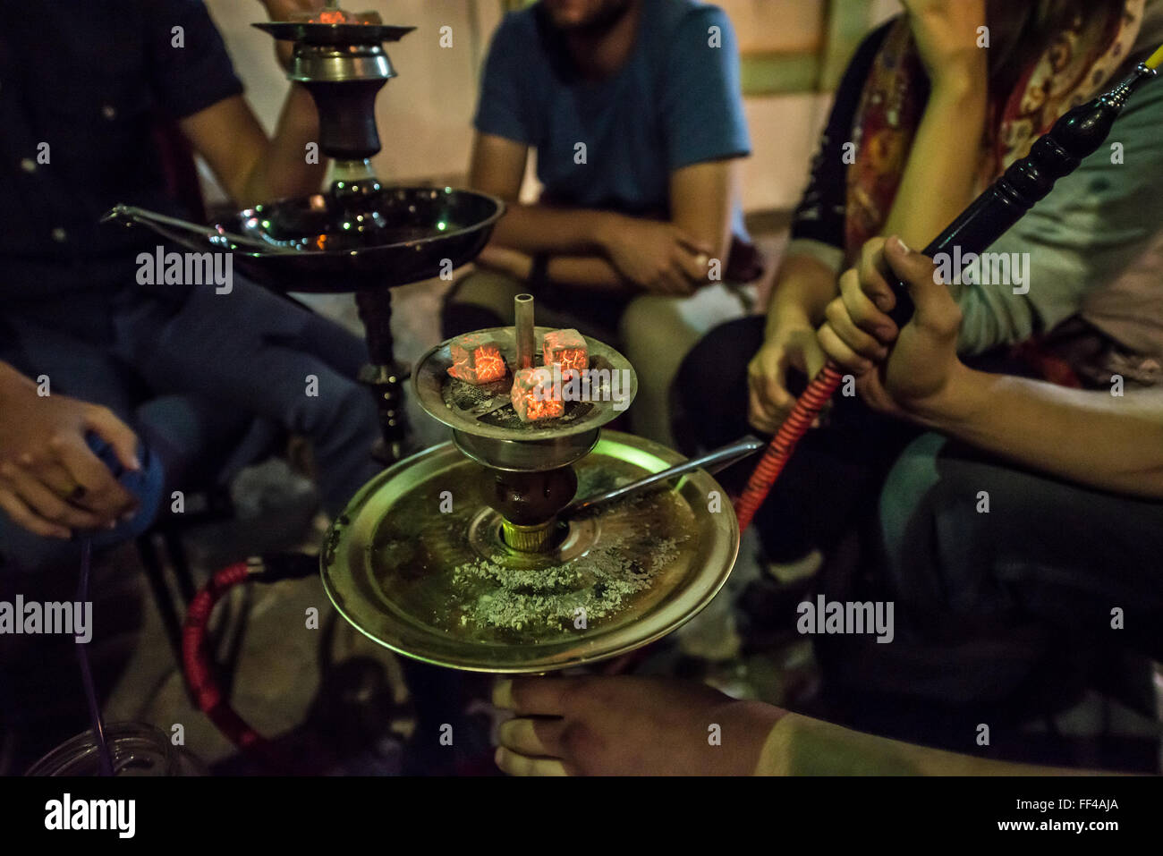 People smoking shisha (hookah) in small pub at Bascarsija historical