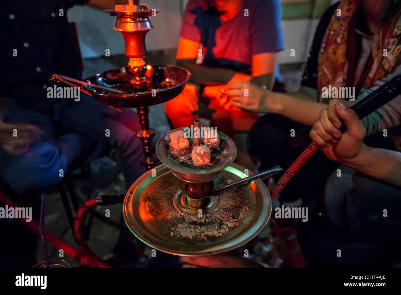 People smoking shisha (hookah) in small pub at Bascarsija historical