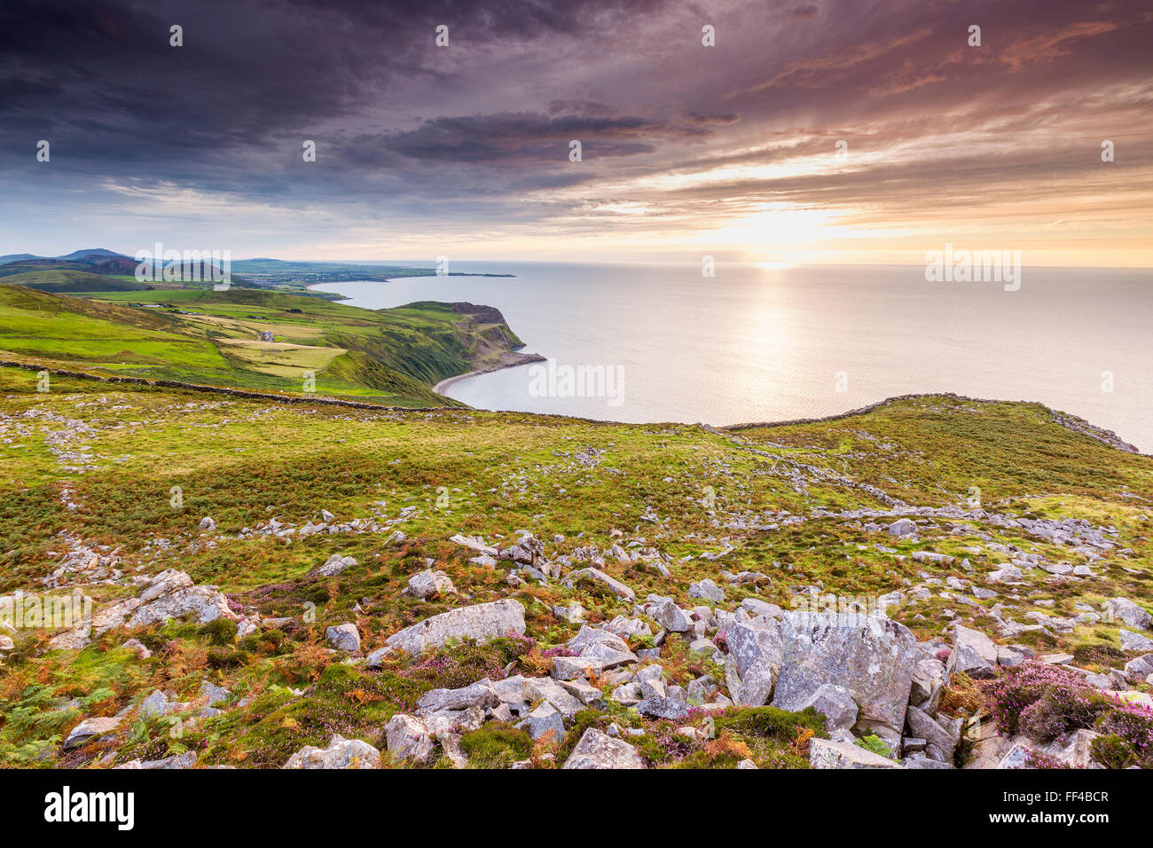 Sunset over Caernarfon Bay, Llithfaen, Gwynedd, Wales, United Kingdom, Europe. Stock Photo