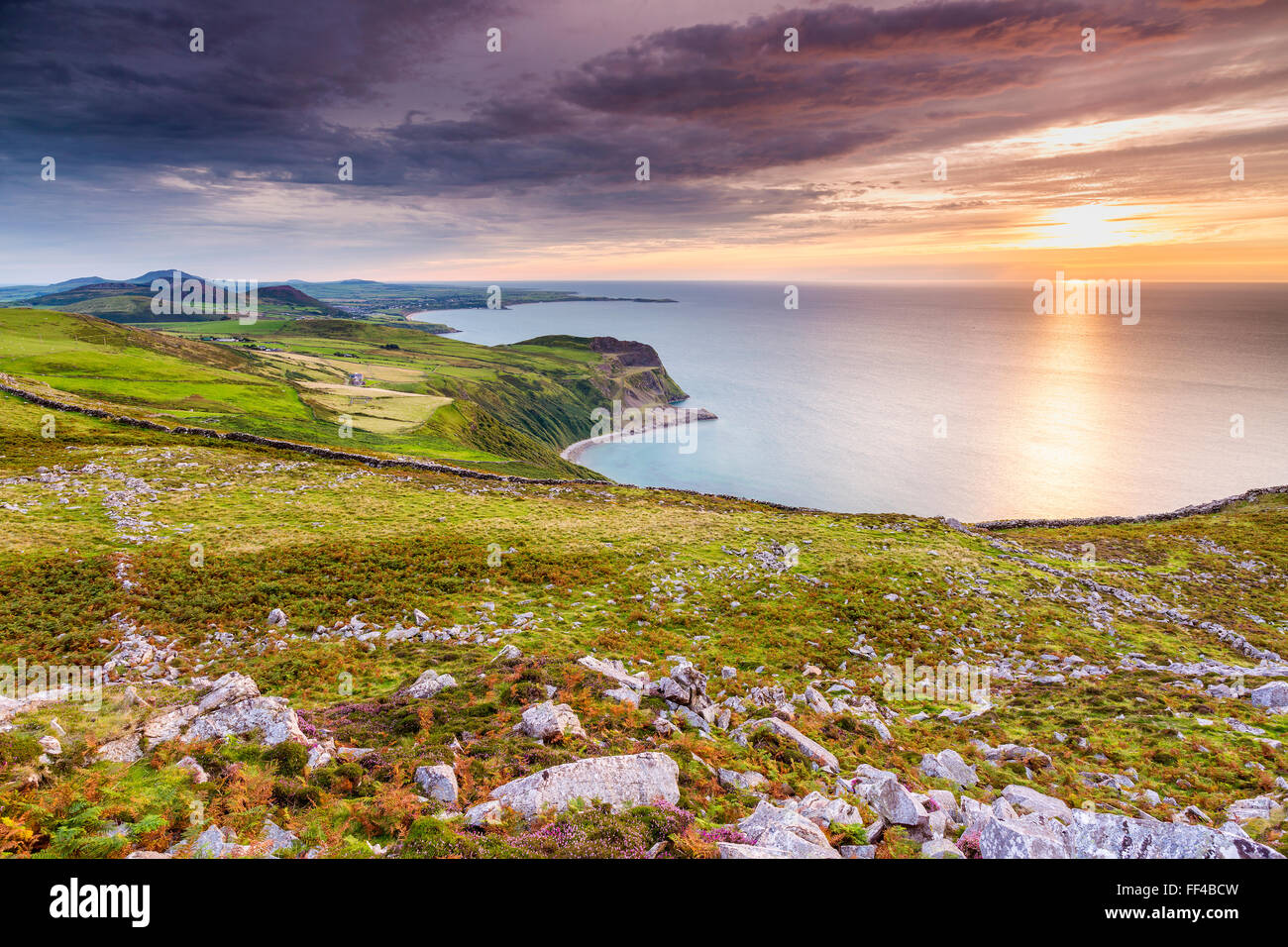 Sunset over Caernarfon Bay, Llithfaen, Gwynedd, Wales, United Kingdom, Europe. Stock Photo