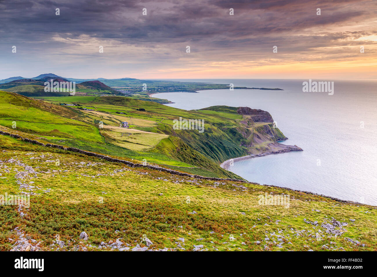 Sunset over Caernarfon Bay, Llithfaen, Gwynedd, Wales, United Kingdom, Europe. Stock Photo