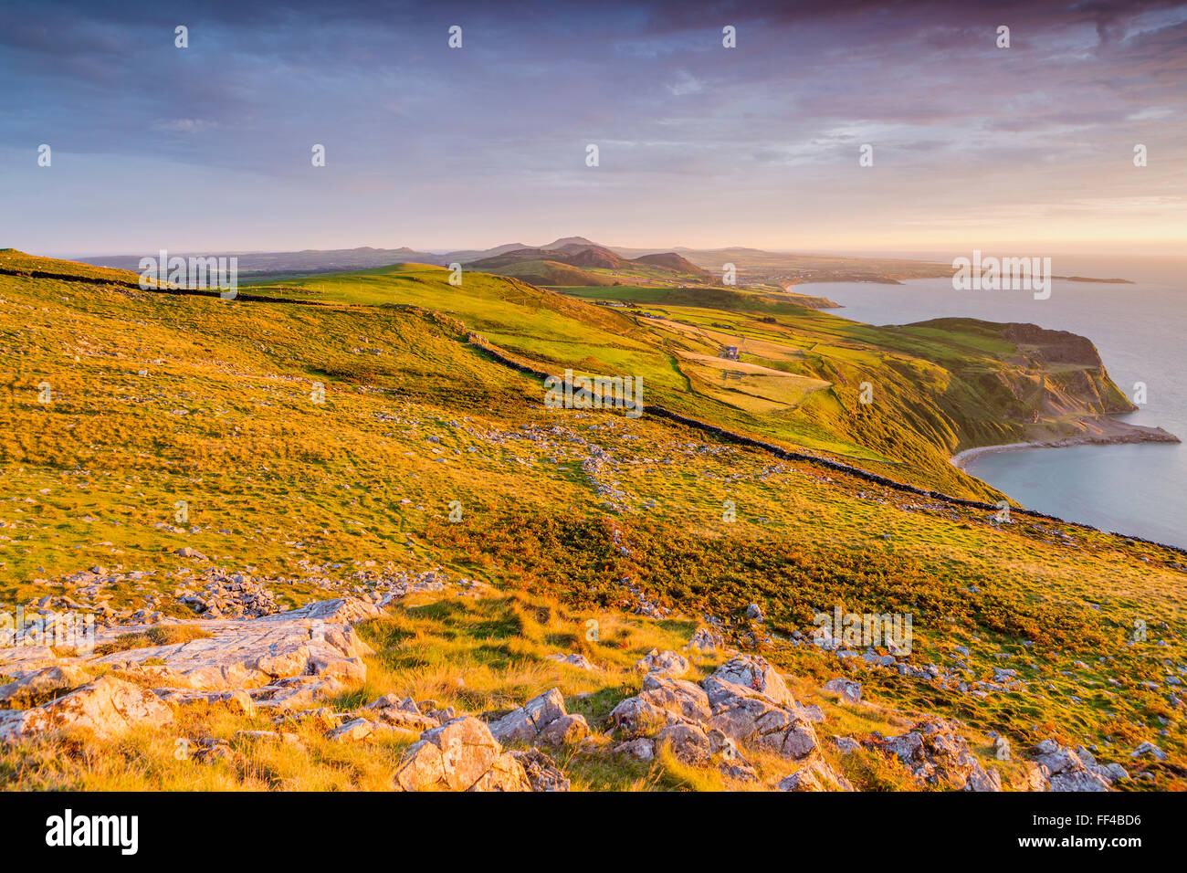 Sunset over Caernarfon Bay, Llithfaen, Gwynedd, Wales, United Kingdom, Europe. Stock Photo