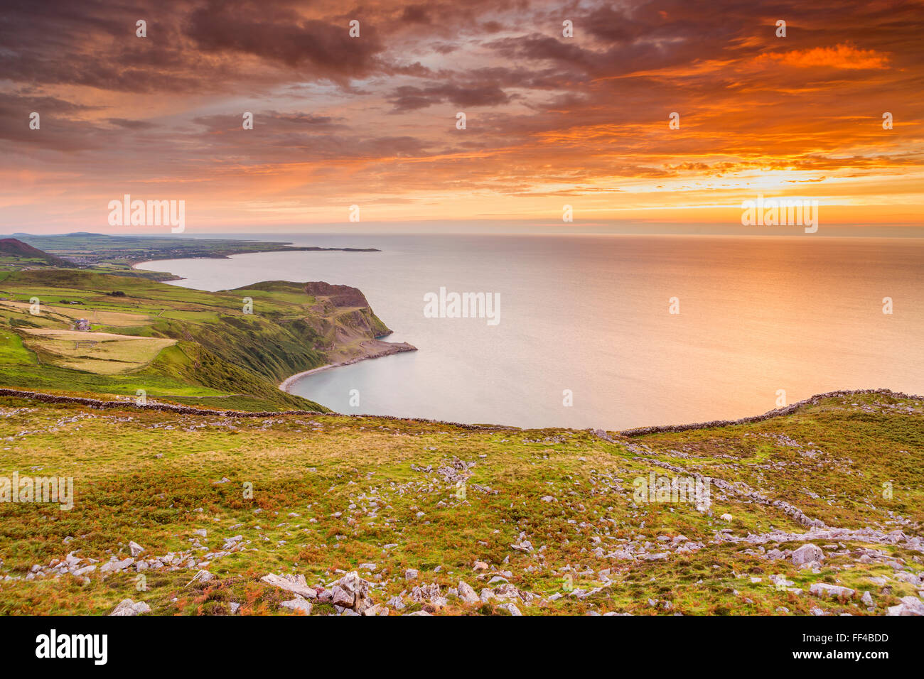 Sunset over Caernarfon Bay, Llithfaen, Gwynedd, Wales, United Kingdom, Europe. Stock Photo