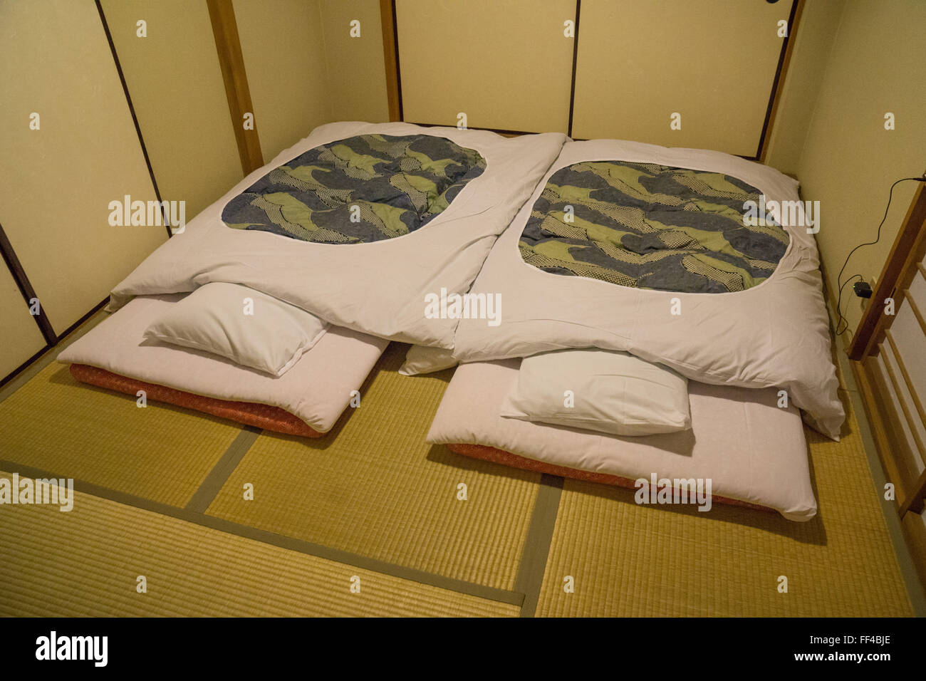 traditional roykan Hakone Japan sleeping quarters on tatami mat Stock Photo