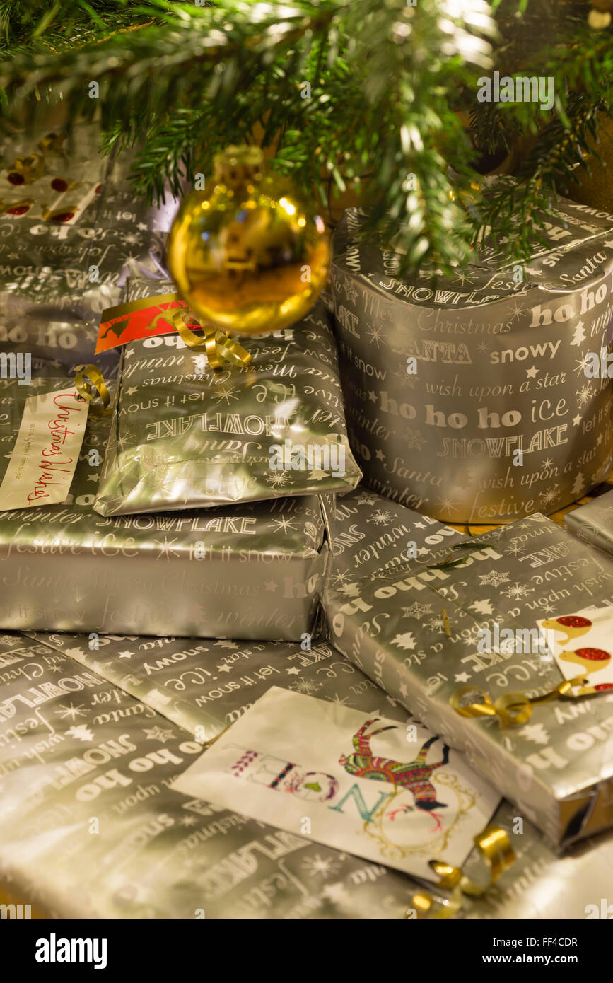 Gifts beneath Christmas tree. Stock Photo