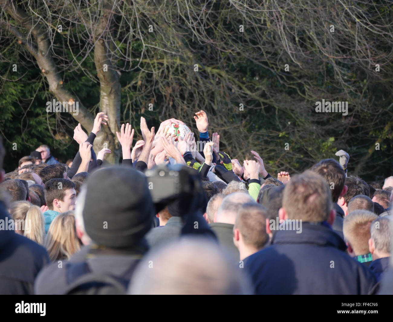 Ashbourne, Derbyshire, UK. 10th February, 2016. Ash Wednesday football match witch is the second day of the Royal Shrovetide Football match in Ashbourne, Derbyshire 2016 The Royal Shrovetide Football features the unconventional football game that is played over two eight hour periods on shrovetide Tuesday & Ash Wednesday. The goal posts 3 miles apart in the river which separated the Northern & Southern half of the Derbyshire town. Credit:  Doug Blane/Alamy Live News Stock Photo
