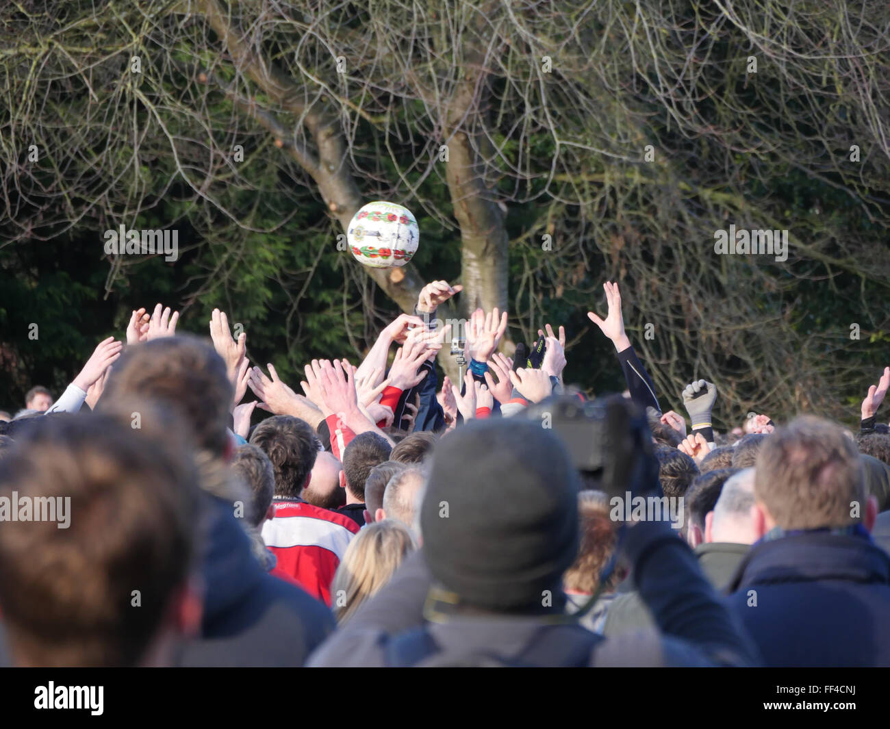 Ashbourne, Derbyshire, UK. 10th February, 2016. Ash Wednesday football match witch is the second day of the Royal Shrovetide Football match in Ashbourne, Derbyshire 2016 The Royal Shrovetide Football features the unconventional football game that is played over two eight hour periods on shrovetide Tuesday & Ash Wednesday. The goal posts 3 miles apart in the river which separated the Northern & Southern half of the Derbyshire town. Credit:  Doug Blane/Alamy Live News Stock Photo