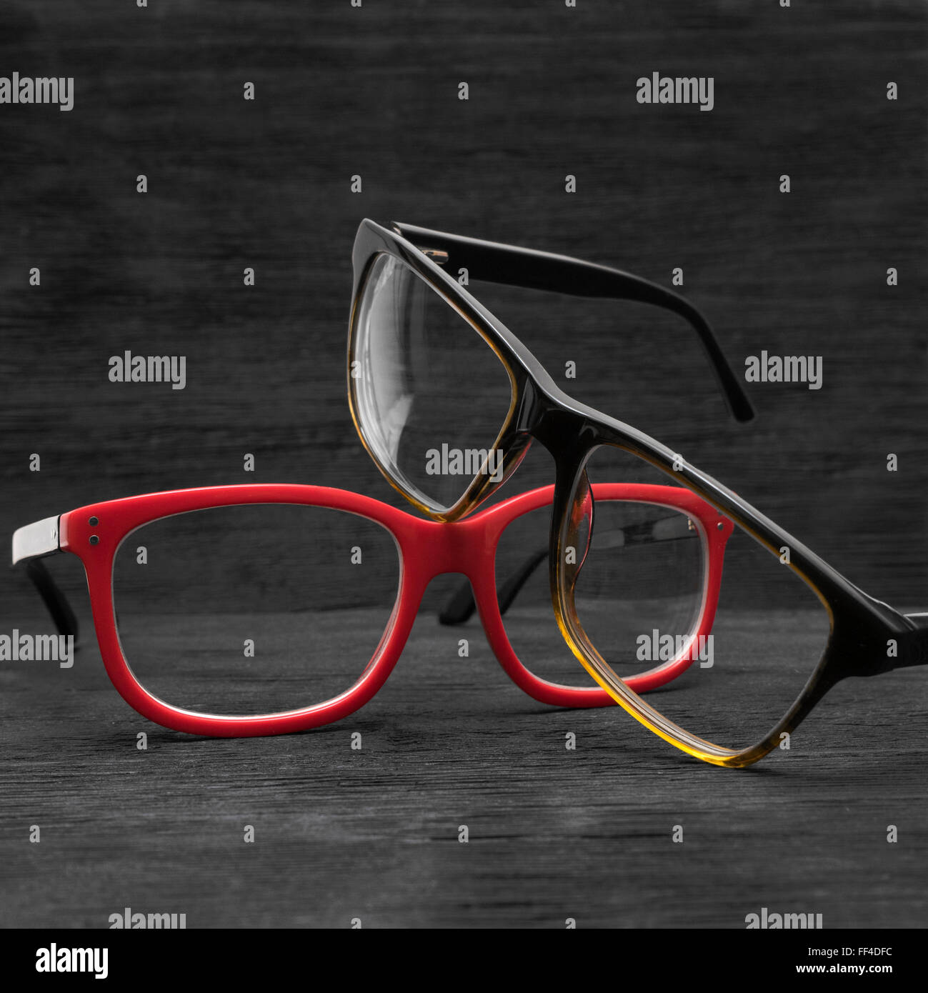 vintage glasses isolated on a wooden background Stock Photo
