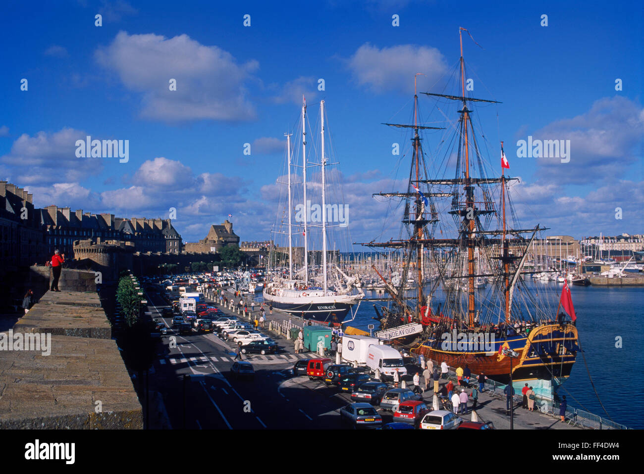 Old schooners and sailboats moored in the port at St-Malo in Brittany, France Stock Photo