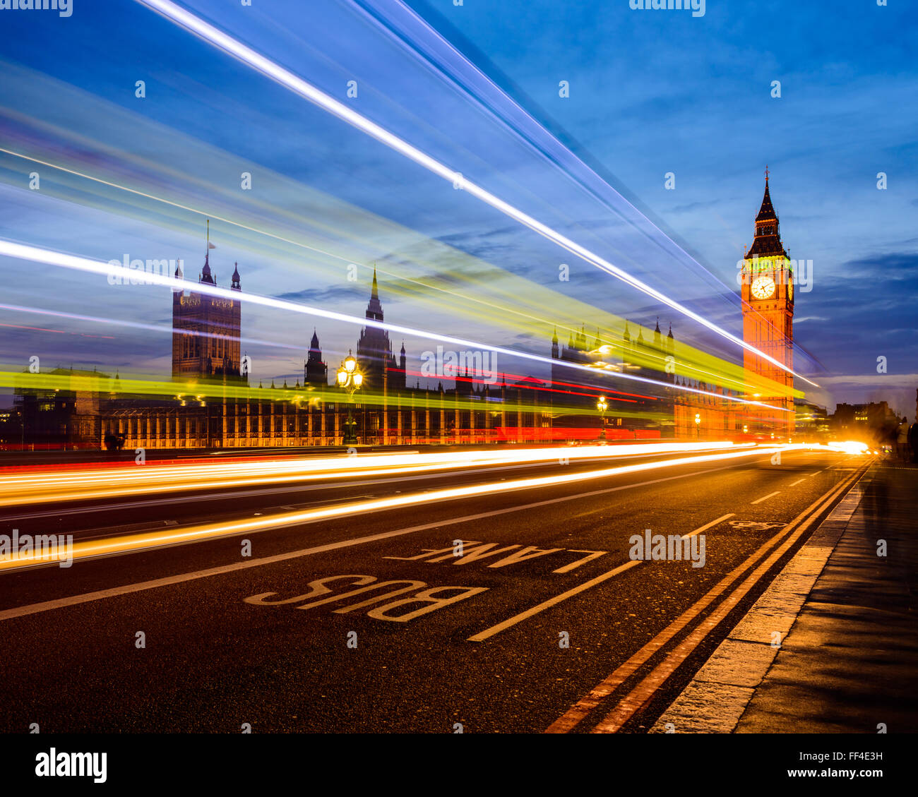Traffic and the Palace of Westminster Stock Photo