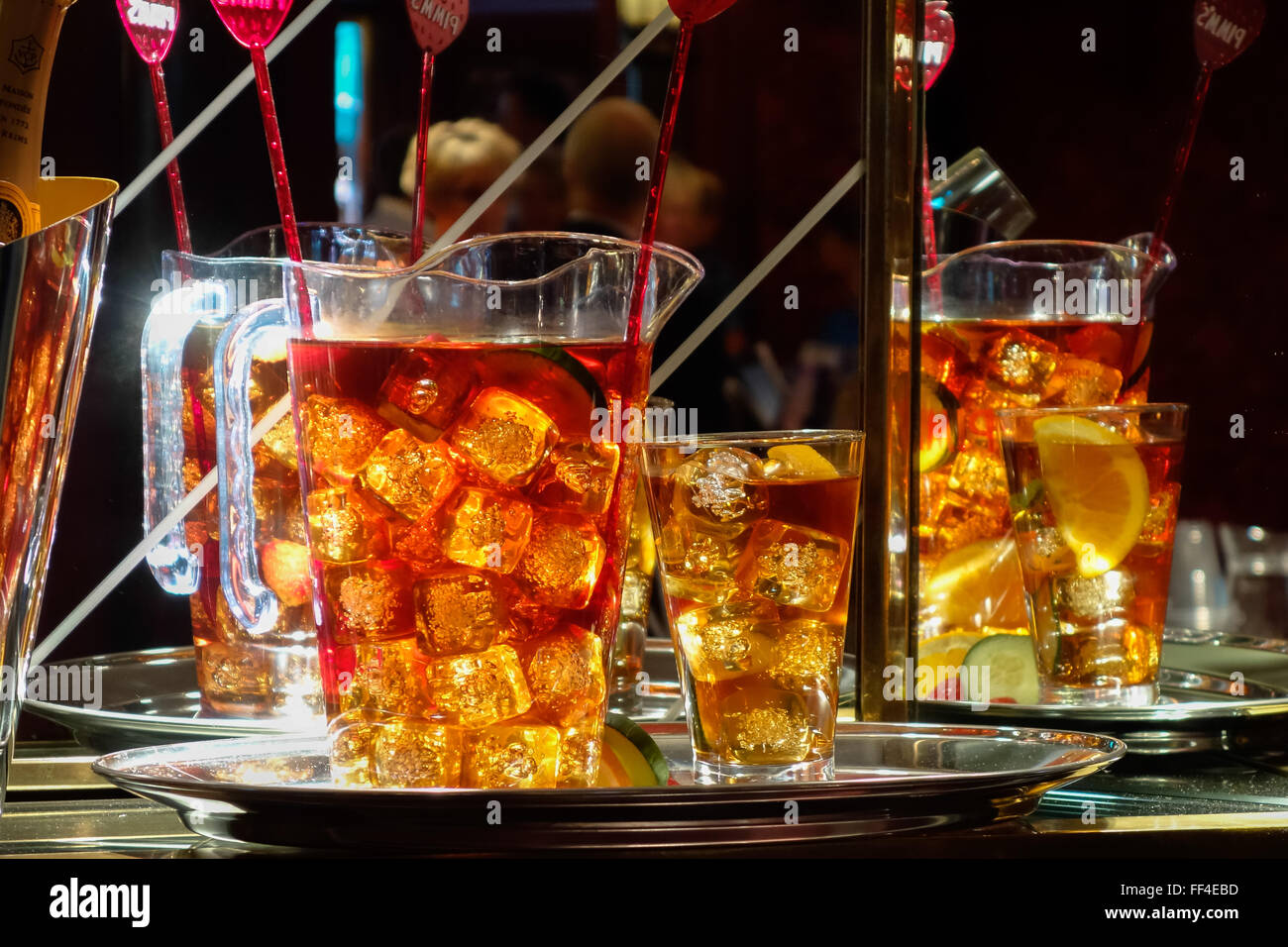 Jugs of a fruity alcoholic drink awaiting collection Stock Photo Alamy