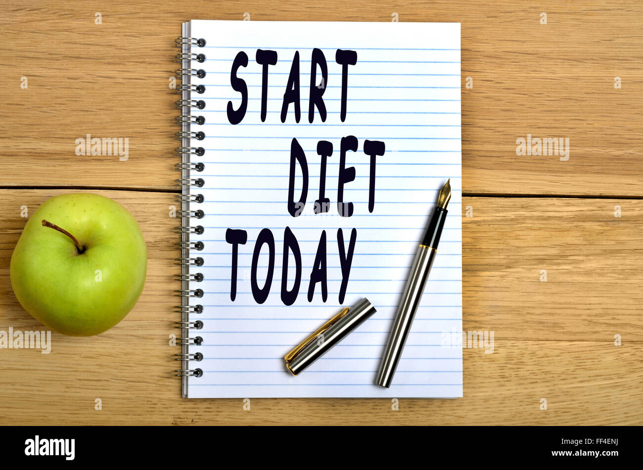 Start diet today text on notebook Stock Photo