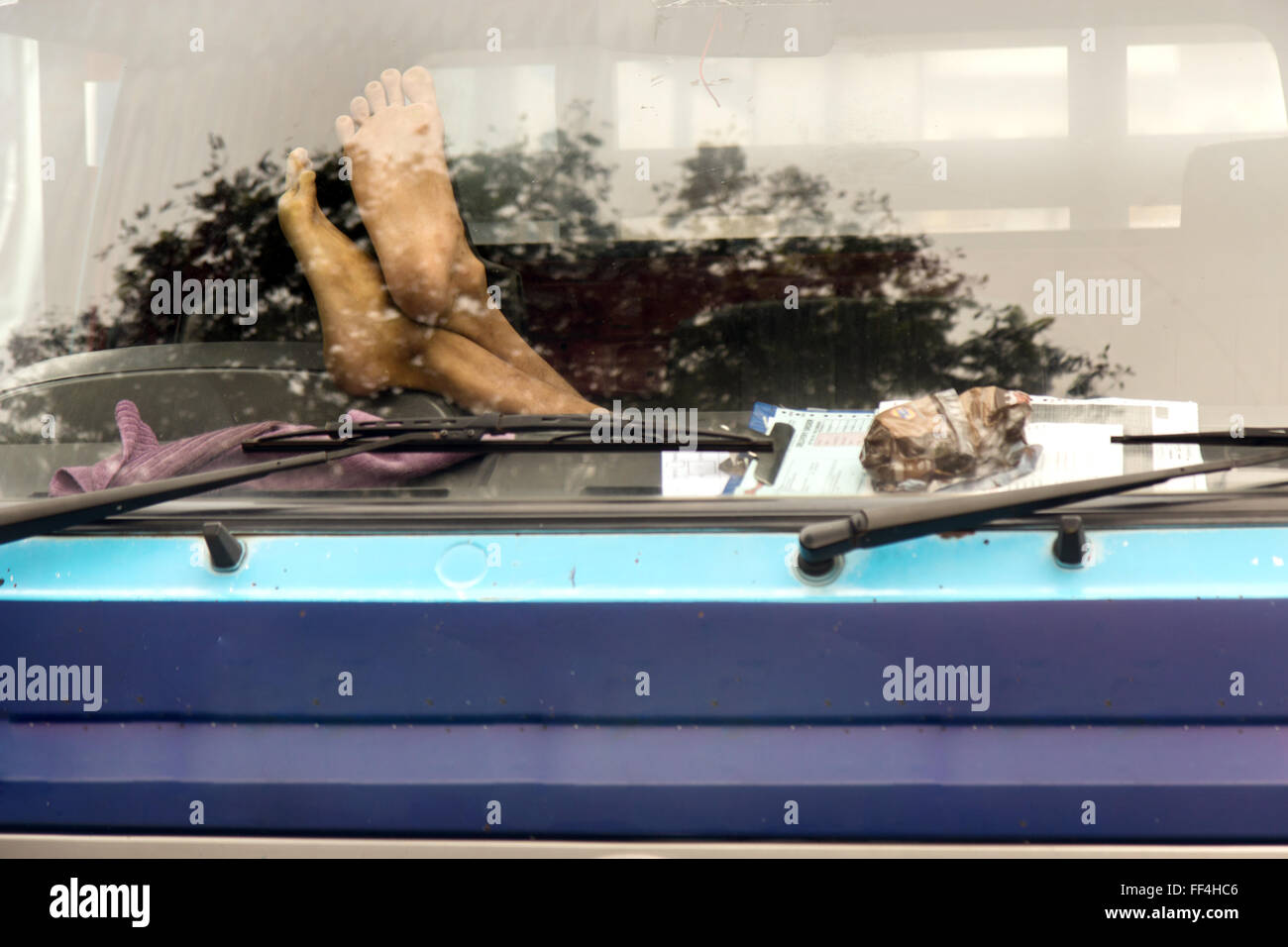 Male feet on the dashboard of the truck Stock Photo Alamy