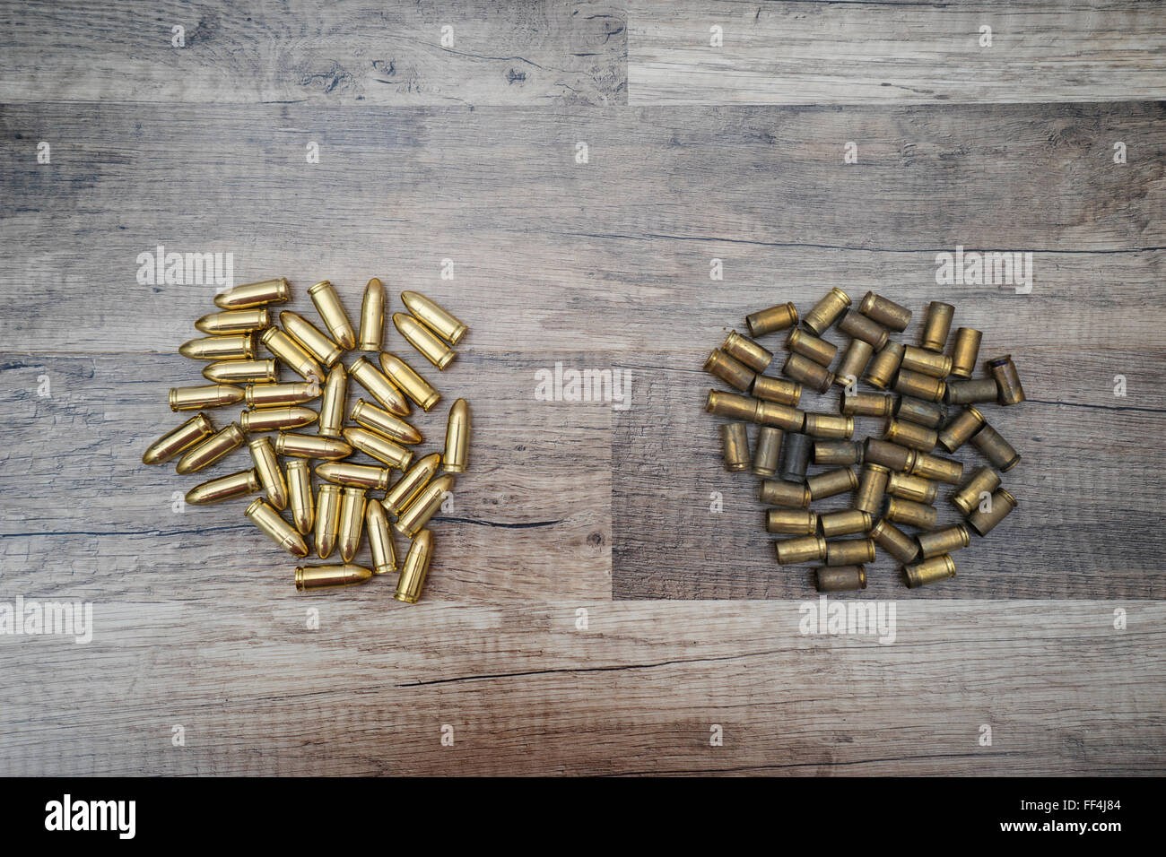 New and used bullets on wooden backgrounds Stock Photo Alamy