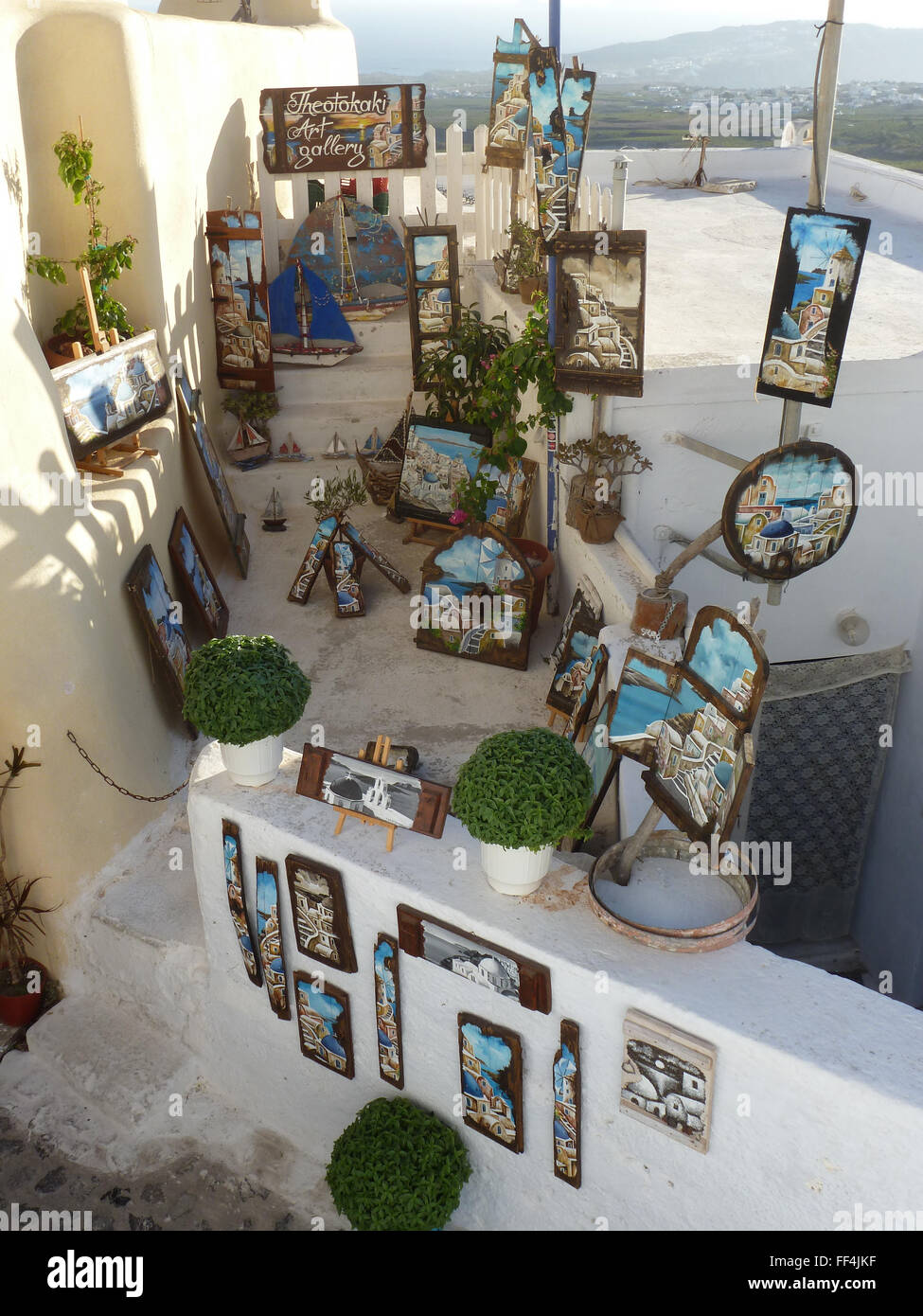 paintings for sale at oia village at santorini greece Stock Photo