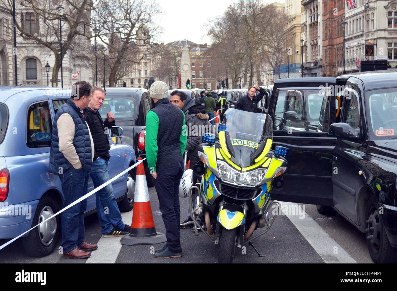 London, UK, 10 February 2016, Approximately 8000 cabs blocked the road from Trafalgar Square, Whitehall and Westminster Bridge as a protest against the app Uber and TFL issuing mini-cab licences. Credit:  JOHNNY ARMSTEAD/Alamy Live News Stock Photo