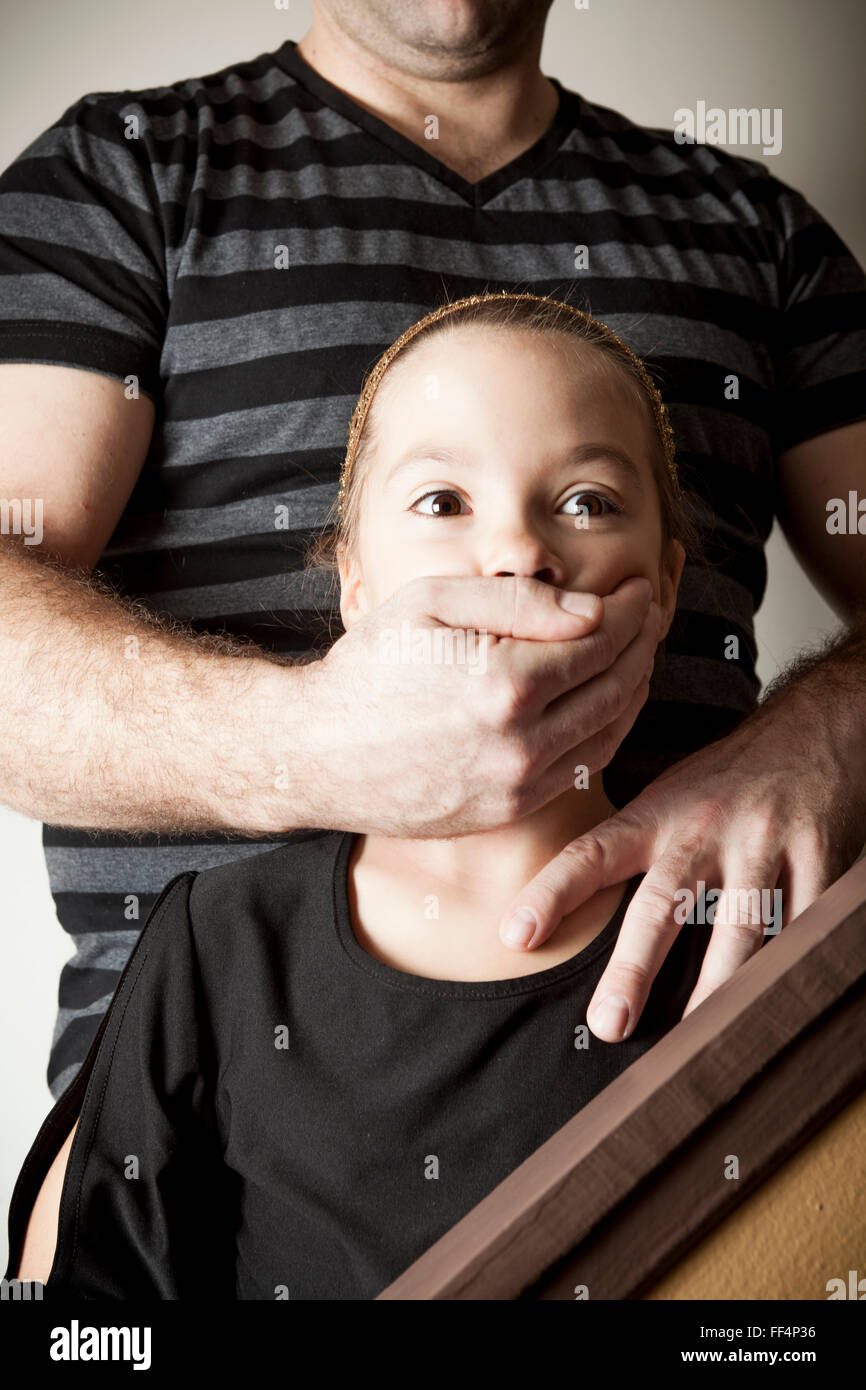 daughter abused father abused his young daughter at home Stock Photo - Alamy