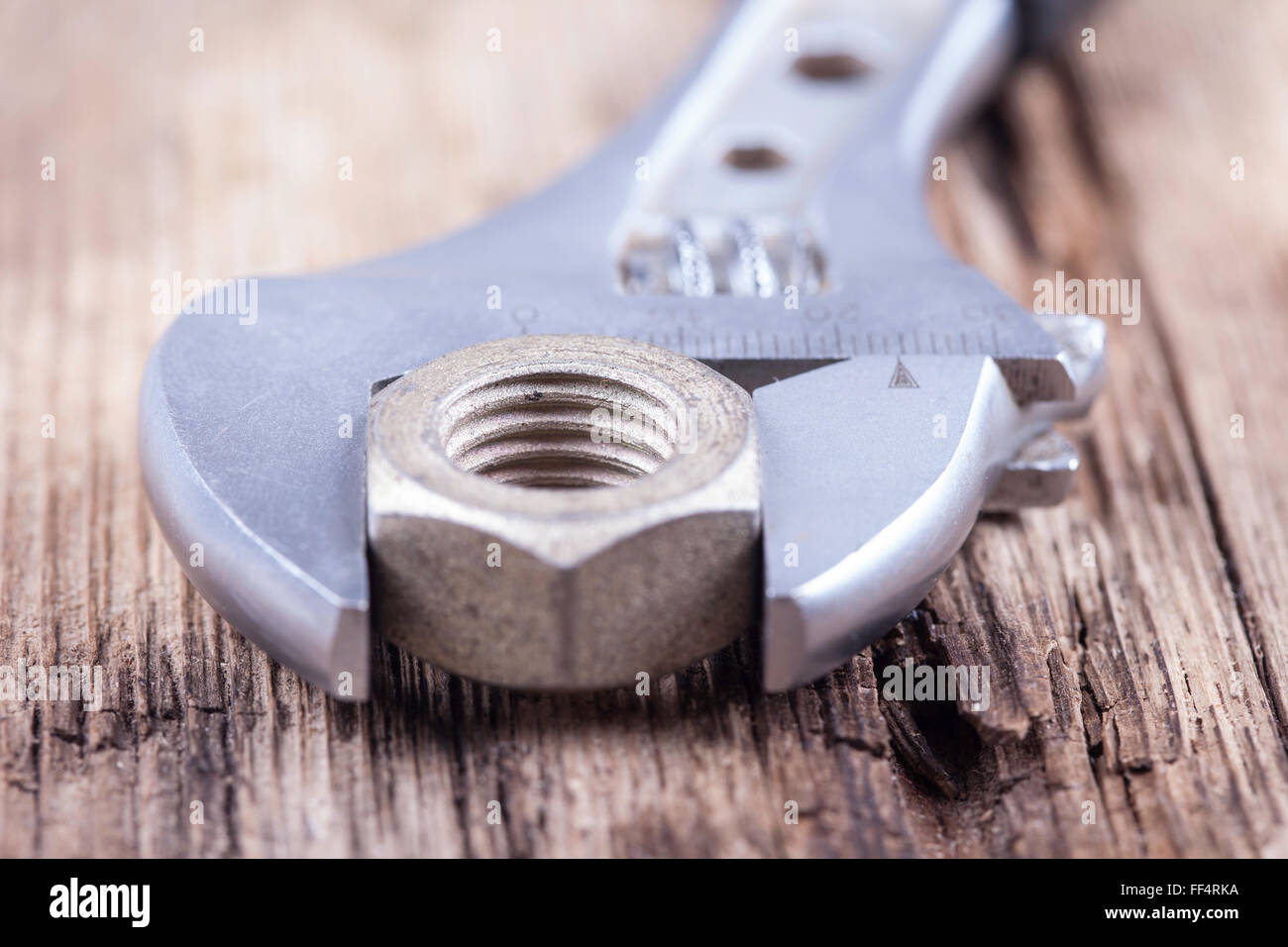 wrench background on grungy wood surface Stock Photo Alamy