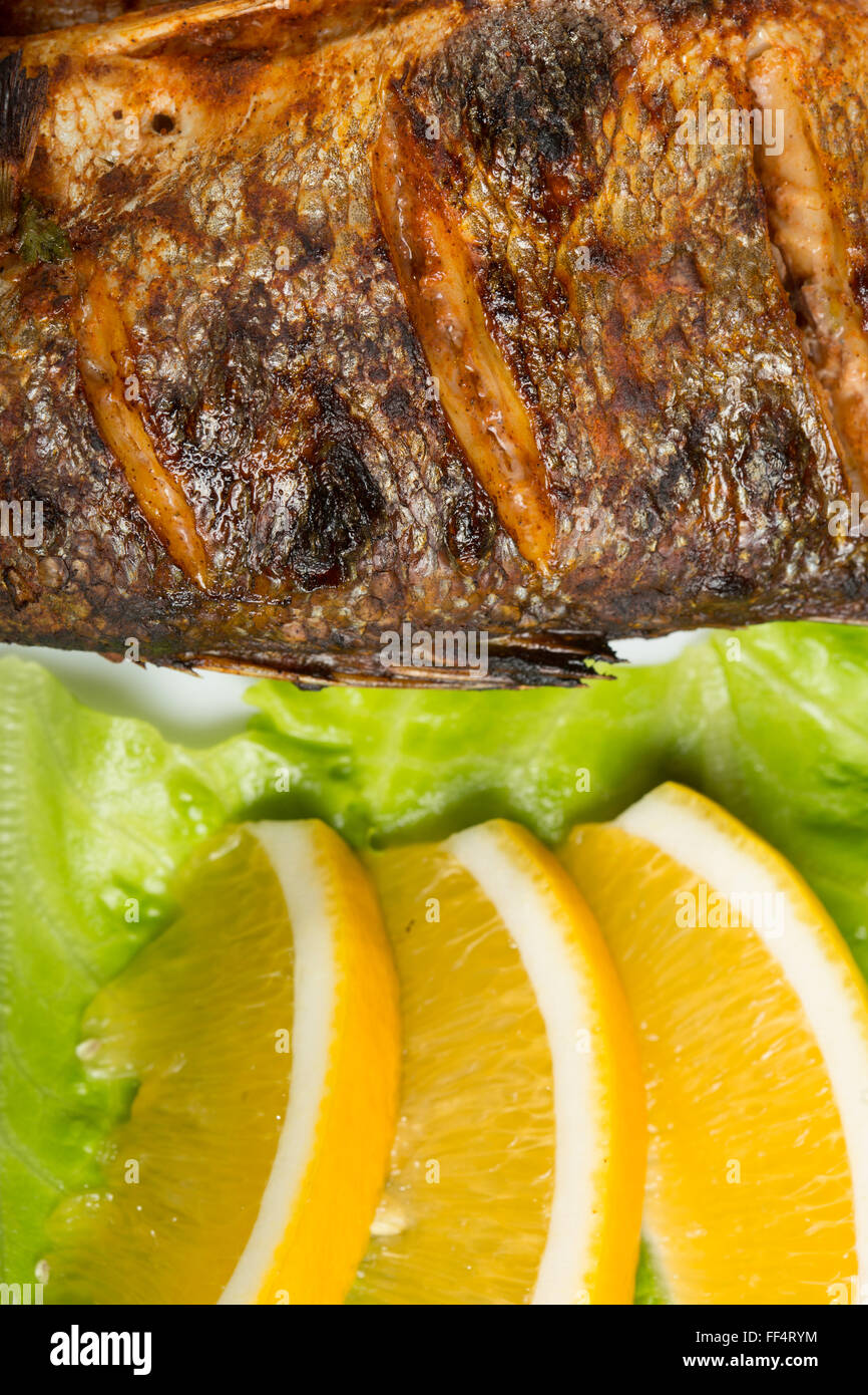 Fish dish fried fish and vegetables Stock Photo Alamy