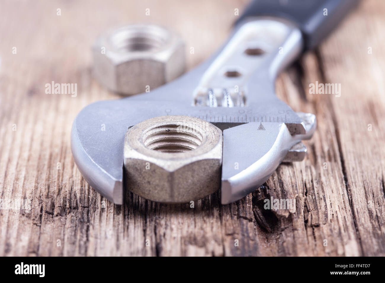 wrench background on grungy wood surface Stock Photo Alamy