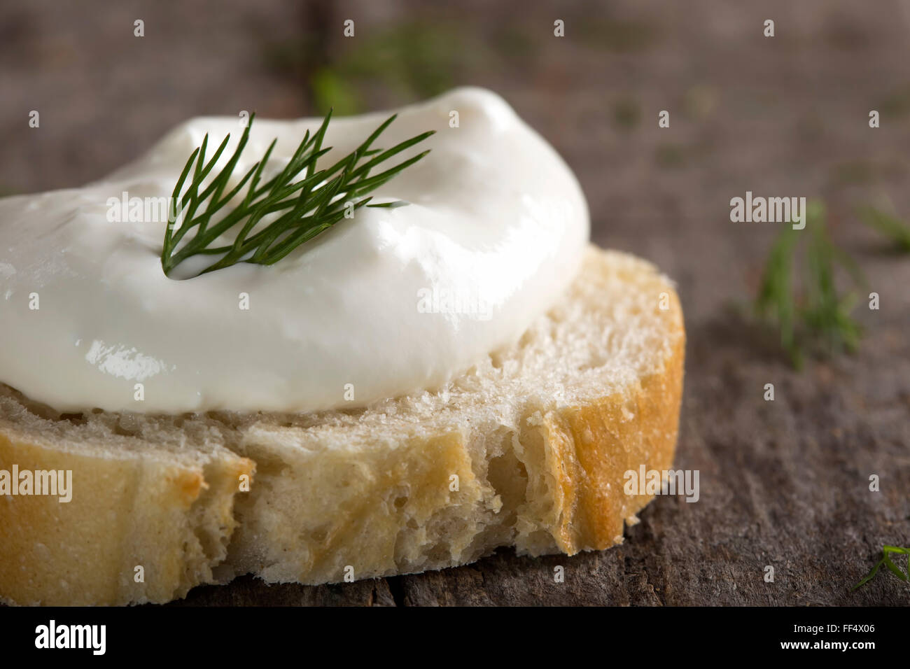 Feta cheese spread with dill on a slice of bread Stock Photo Alamy