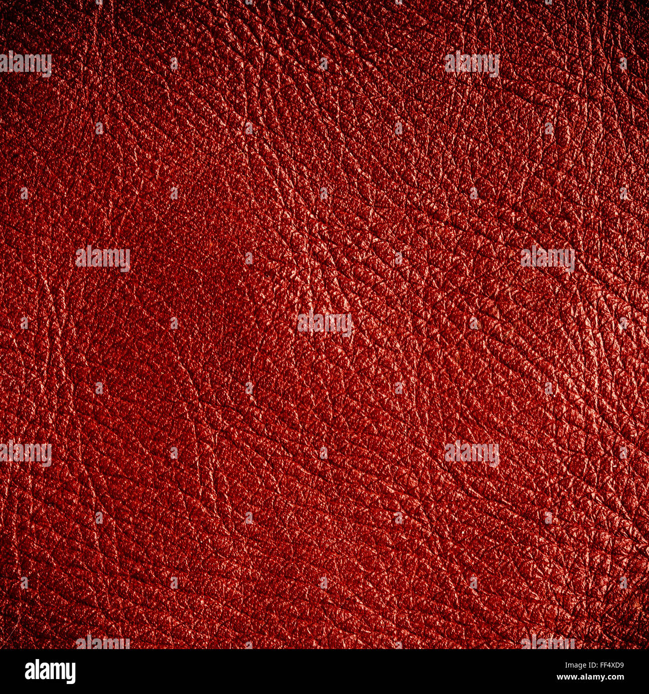 Red leather texture closeup grunge background. Country western