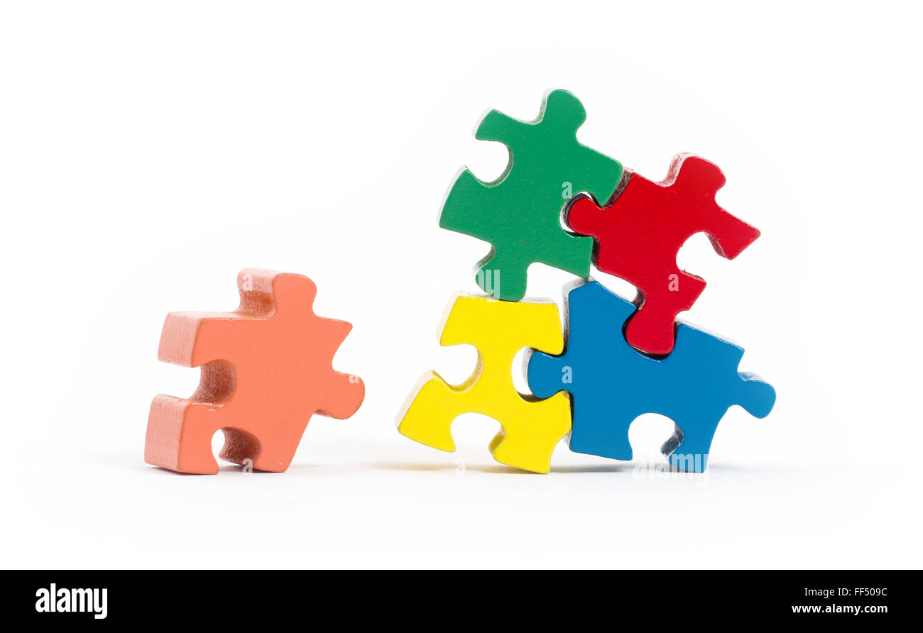 Closeup of big jigsaw puzzle pieces isolated on white Stock Photo
