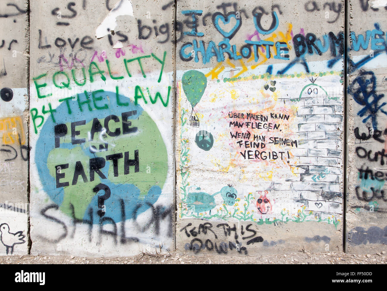 BETHLEHEM, ISRAEL - MARCH 6, 2015: The Detail of graffitti on the Separation barrier. Stock Photo