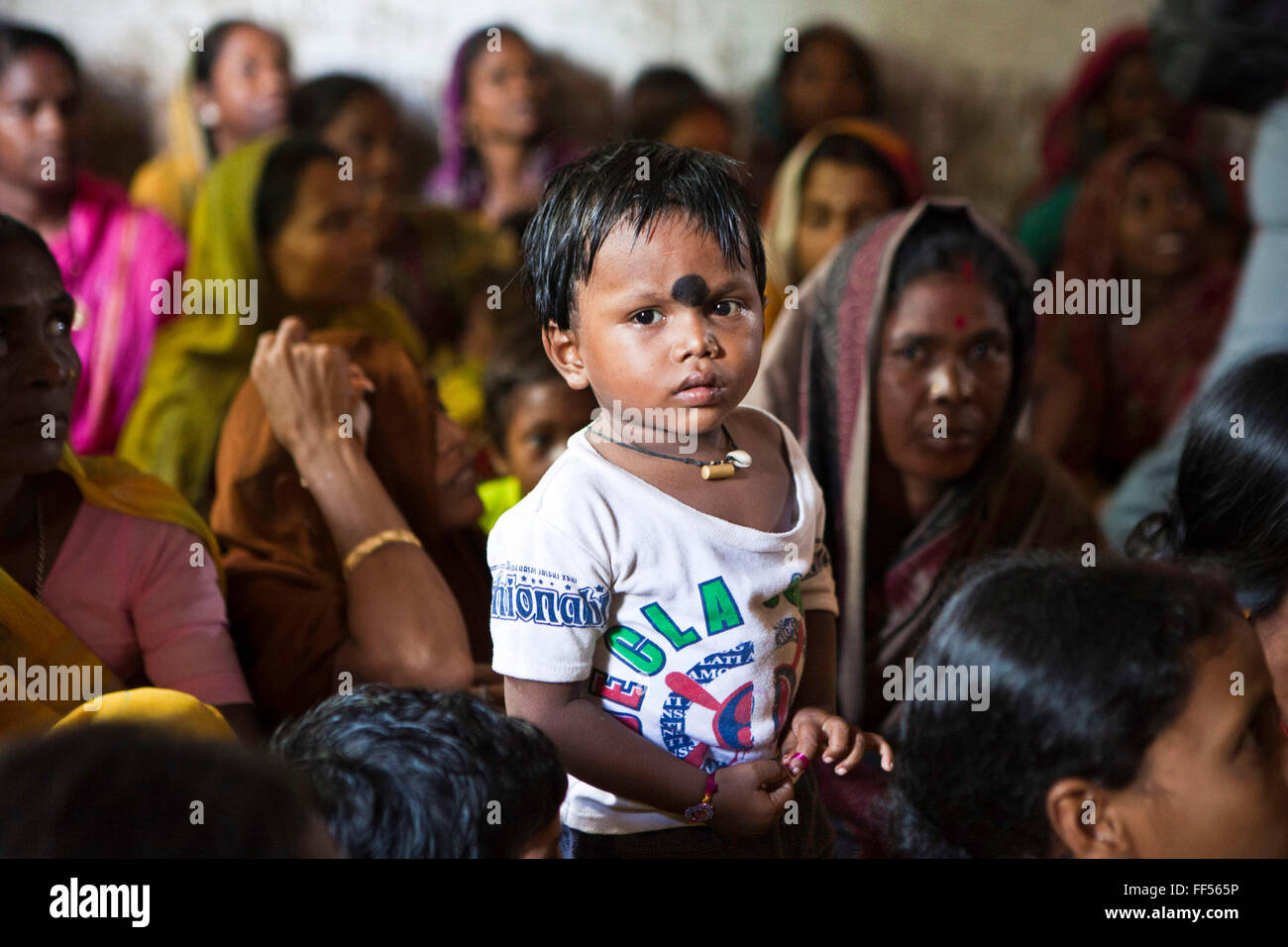 Families from Cuttack get legal advice and birth certificates from a Legal Aid Clinic run by the organisation CLAP. Committee for Legal Aid to Poor (CLAP), helps provide legal aid to the poorer communities in the Orissa district of India. Stock Photo