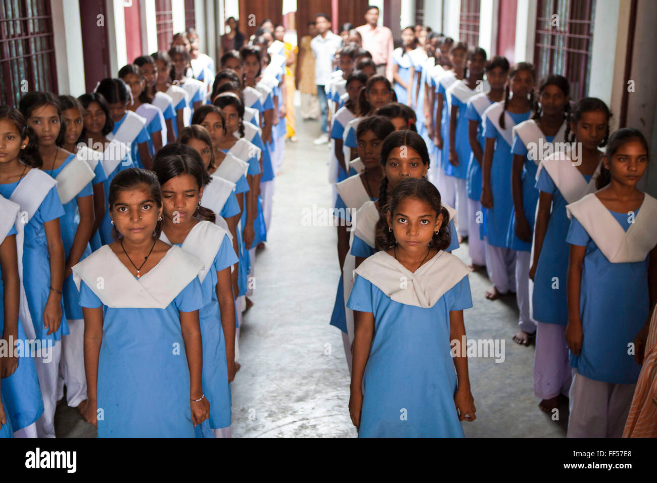 The school girls at the Kasturba Gandhi Balika Vidayala School in Gorakhpur, India. These girls wouldn’t normally be able to go to school and are funded by Manav Seva Sansthan, MSS organisation. The non-profit organization pay for their rent, food and clothes as part of their anti trafficking project. Stock Photo