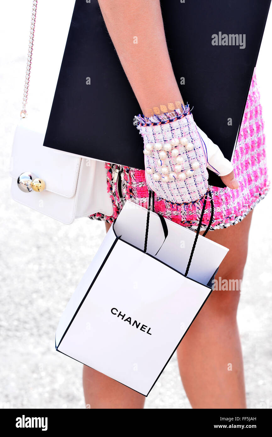 Chanel Pearl Gloves - Paris Fashion Week clutches and bags Stock Photo -  Alamy