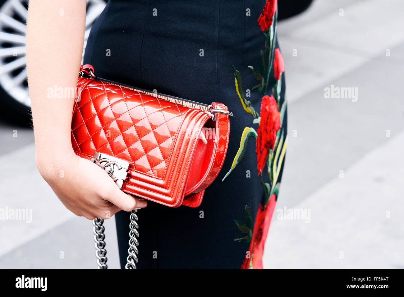Red Chanel Bag with badges - Paris Fashion Week clutches and bags Stock  Photo - Alamy