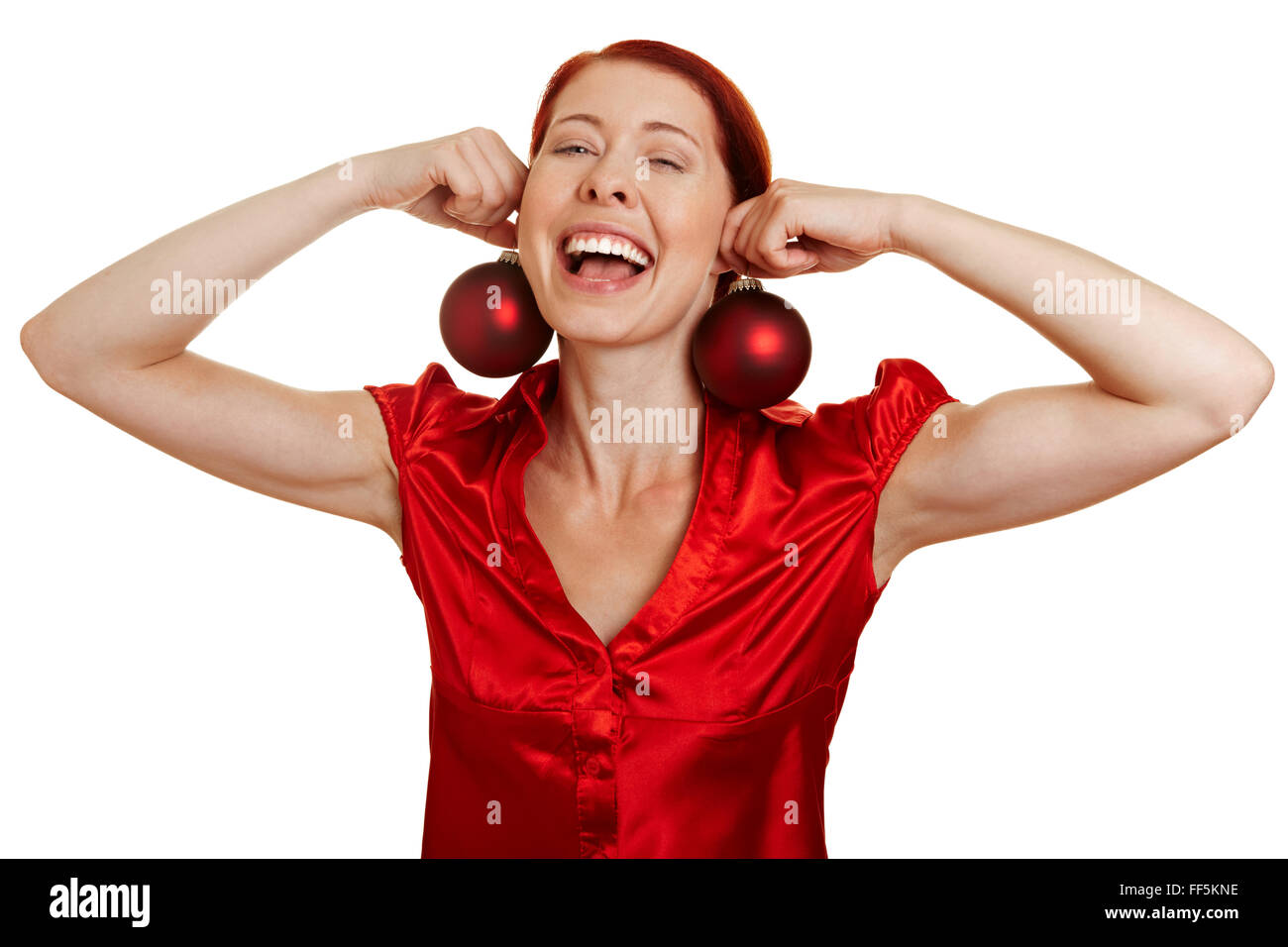 Happy woman with christmas tree balls as earrings Stock Photo